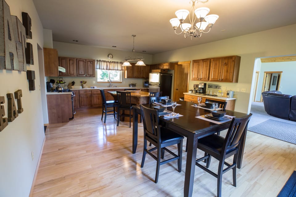 Open kitchen with island and dinning seating