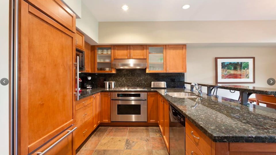 Fully stocked, large executive kitchen! Heated slate floors!