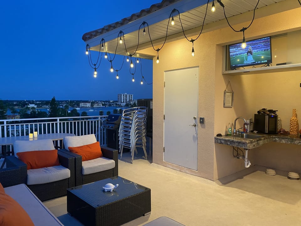Watch the game under the stars with a private bar area and grill