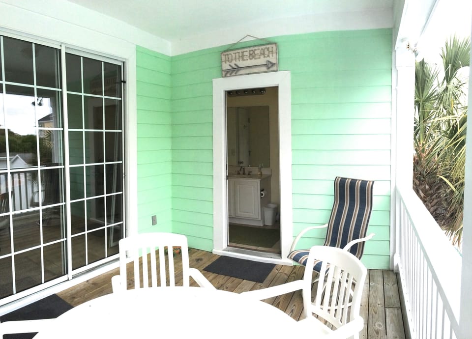 A door to the bathroom from the deck, makes those pool time bathroom breaks easy