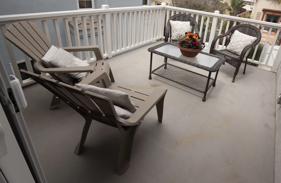 Upstairs deck for morning coffee time, is accessed off the family room.