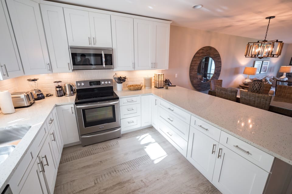 Newly renovated kitchen with quartz counters