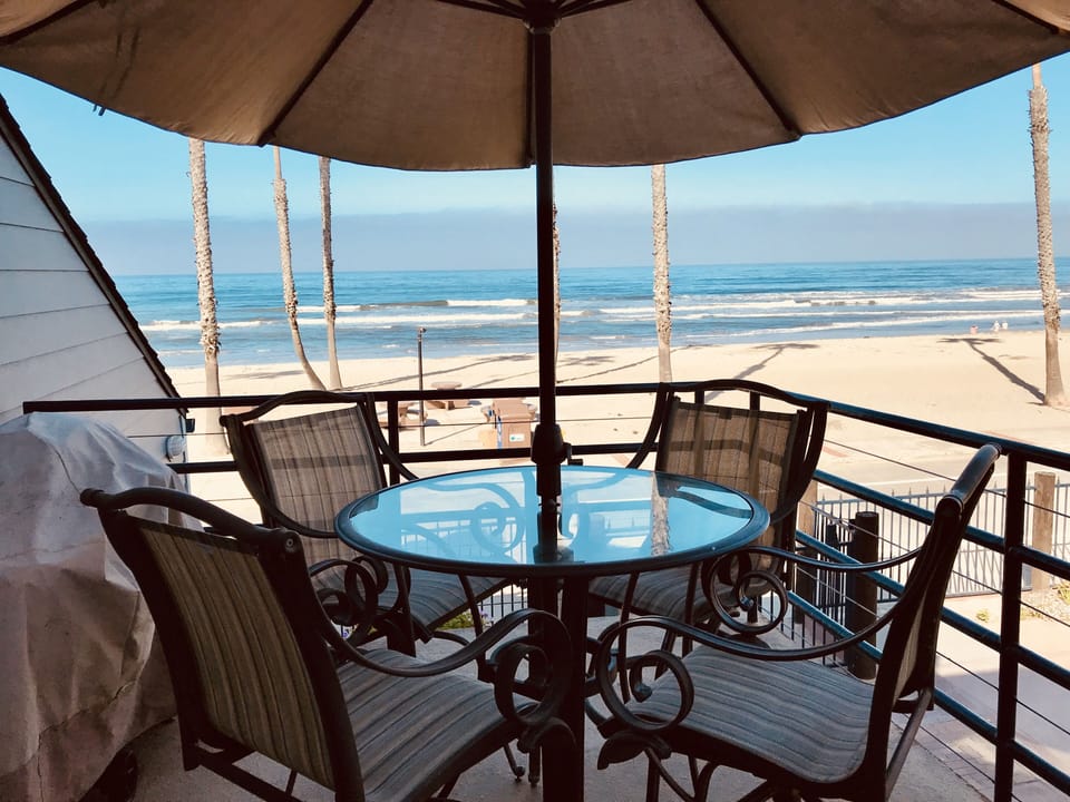 Seating for four and a gas grill on our private balcony. Best view in town! 