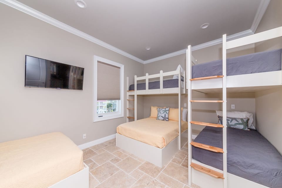 2nd floor bunk room sleeps 8 with USB outlets by every bed. 