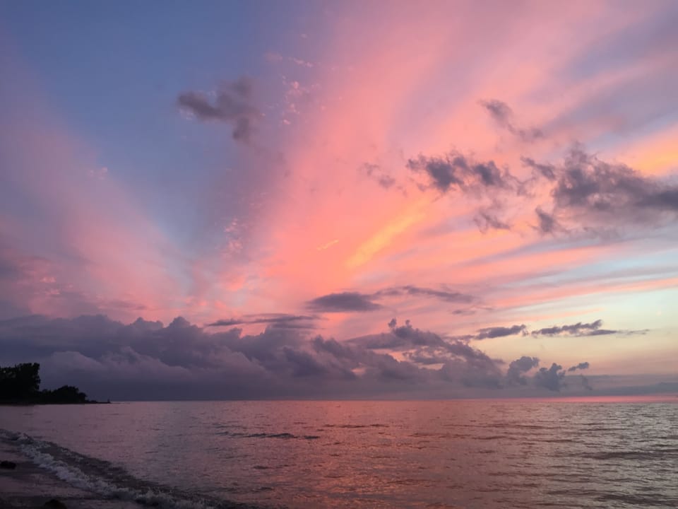 Sunset from the beach in front of the house!