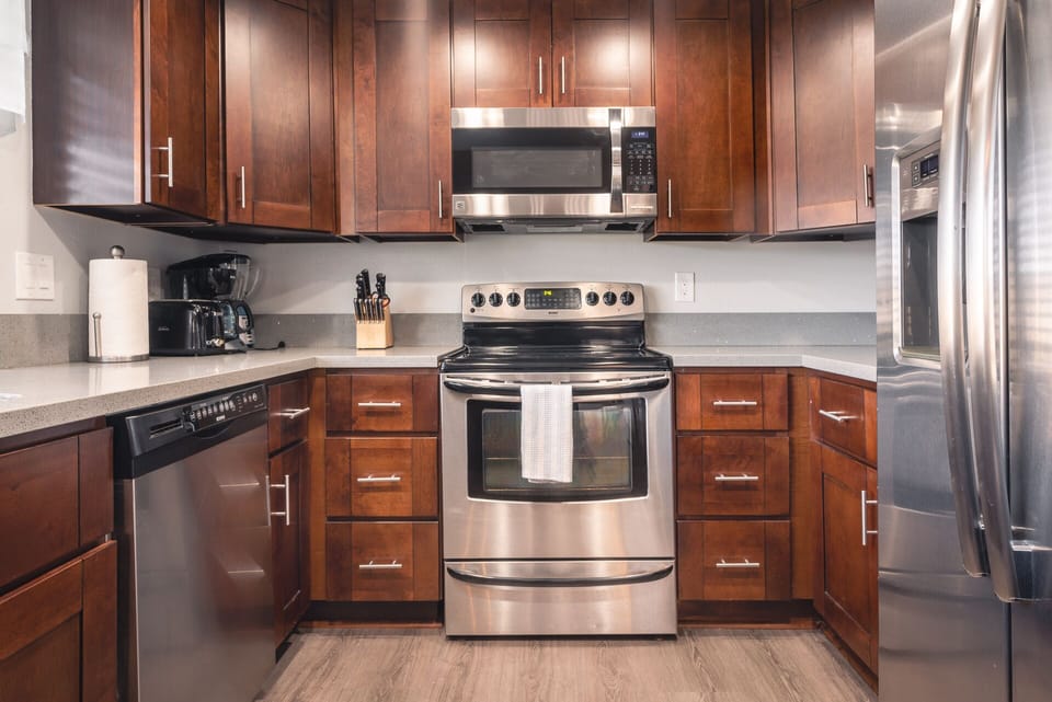 Newly remodeled kitchen with stainless steel appliances.