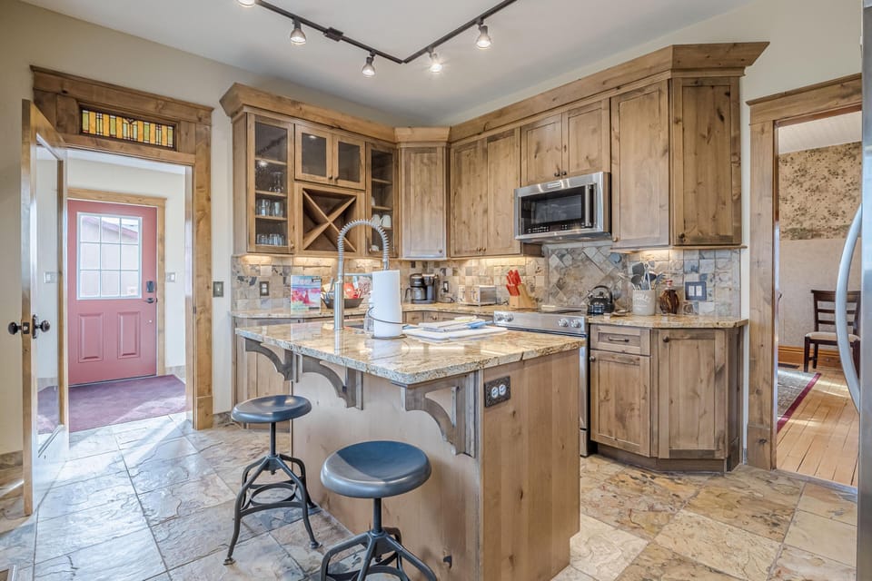 "Gather, cook, and connect in this inviting kitchen and dining space, designed for effortless meals and good conversation.