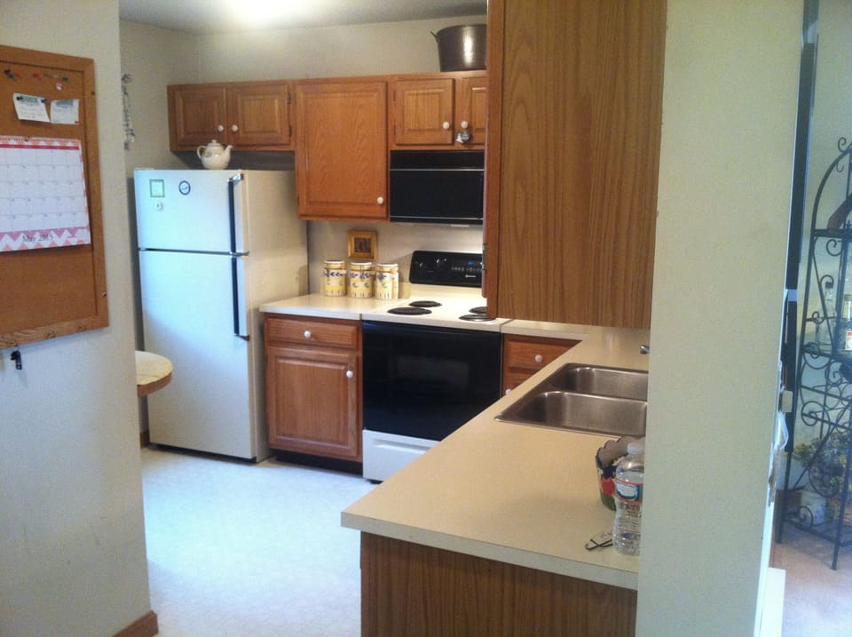 Our Kitchen with Fridge, Dishwasher, Microwave, Toaster oven, and Coffee maker 