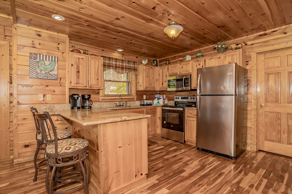 Well stocked kitchen, stainless steel appliances.