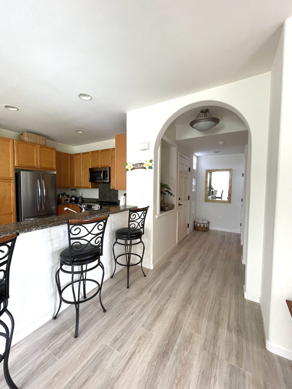 Entry hallway into kitchen and living room