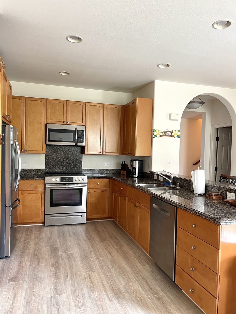 Kitchen with granite counters and breakfast bar