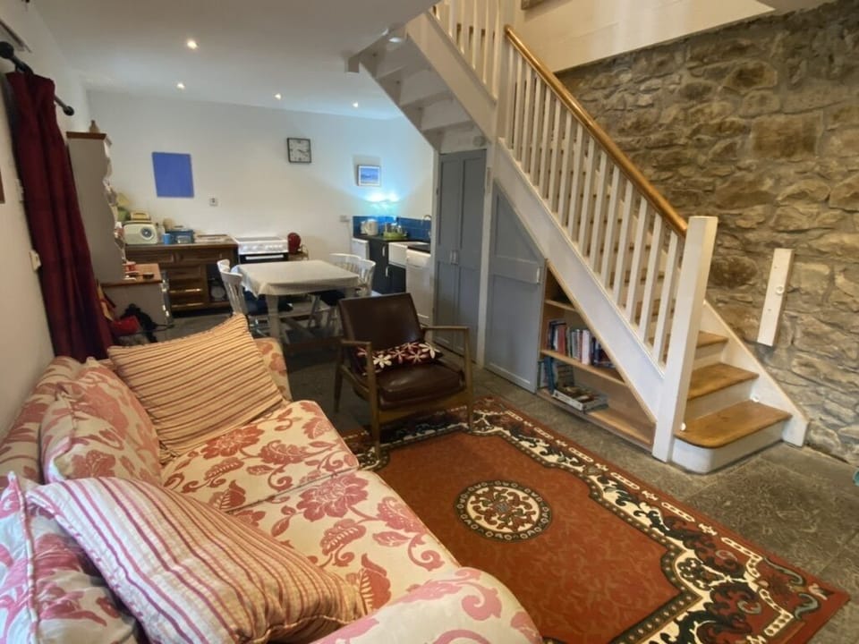 Seated area main room beside stove