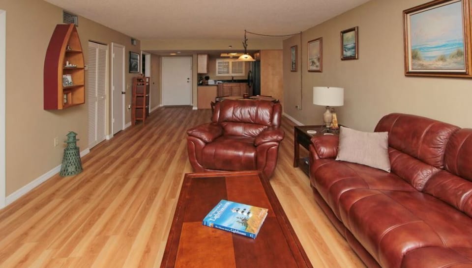 The living room is perfect for entertaining & features recliners for relaxation