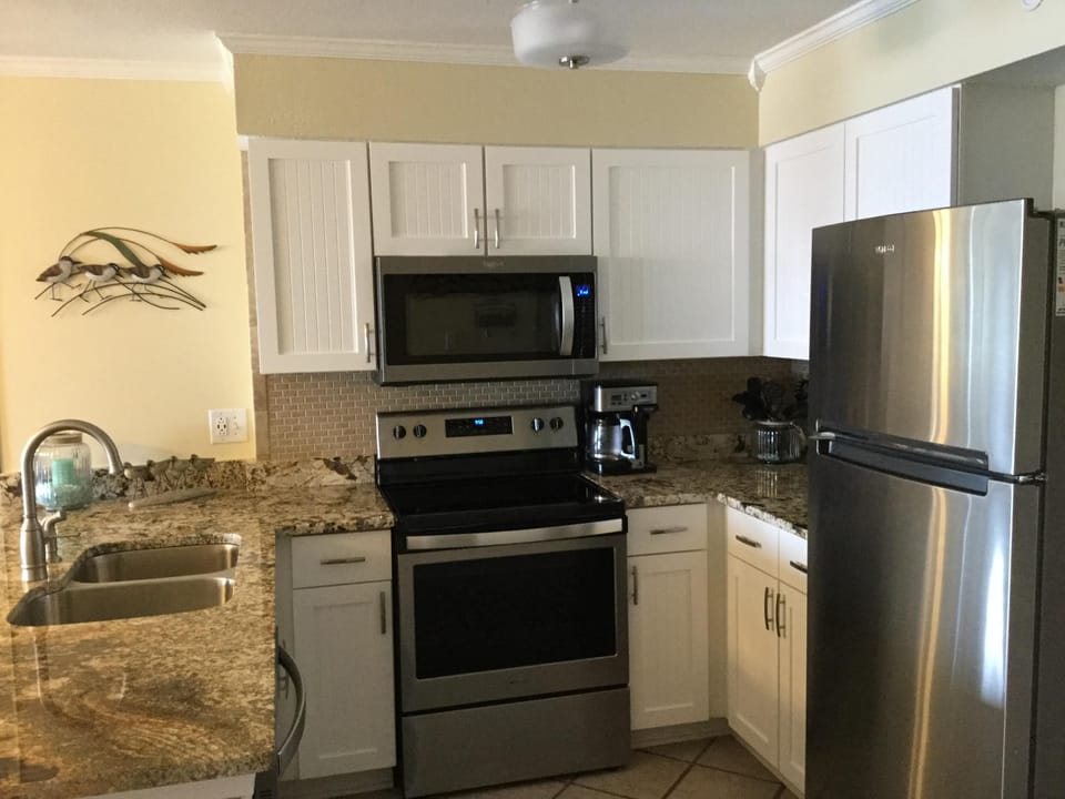 Completely remodeled fully stocked kitchen w/new stainless appliances.  