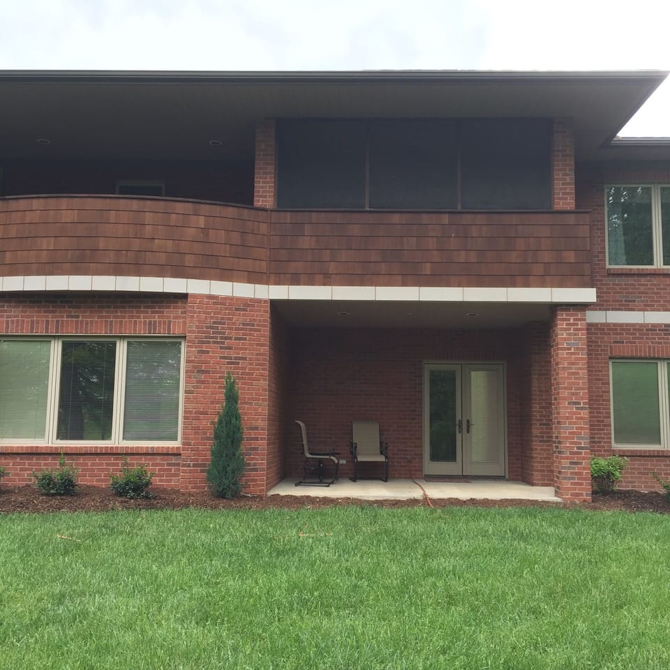 Outside of porch & balcony off upper & lower level family rooms