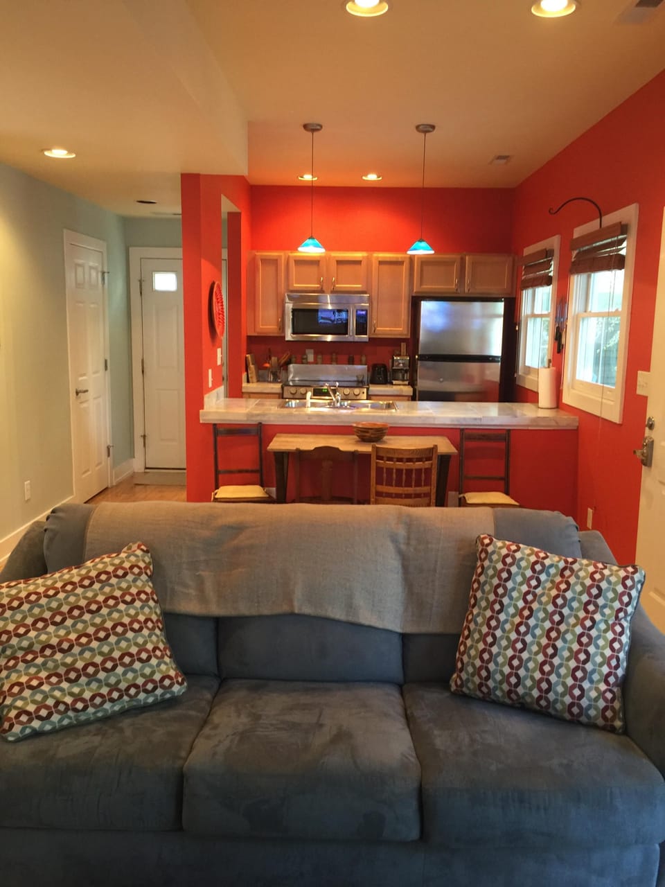 front door to right and back door visible. Open first floor