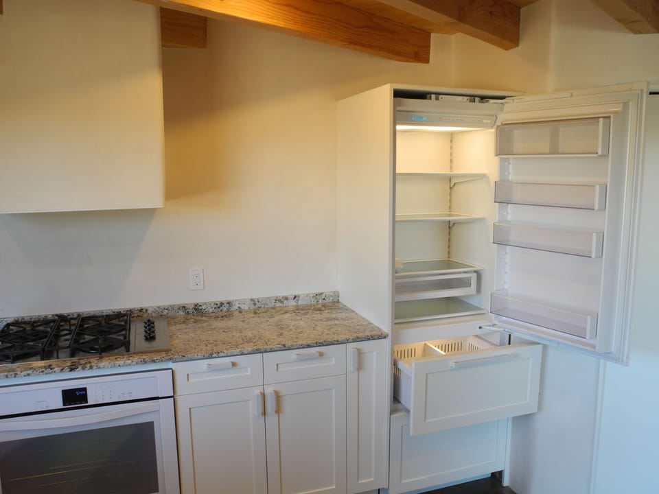All new high-end appliances including gas range, dishwasher & sub-zero fridge.