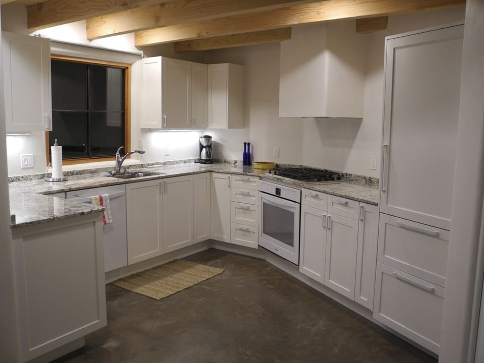 Ample countertop and cabinet space