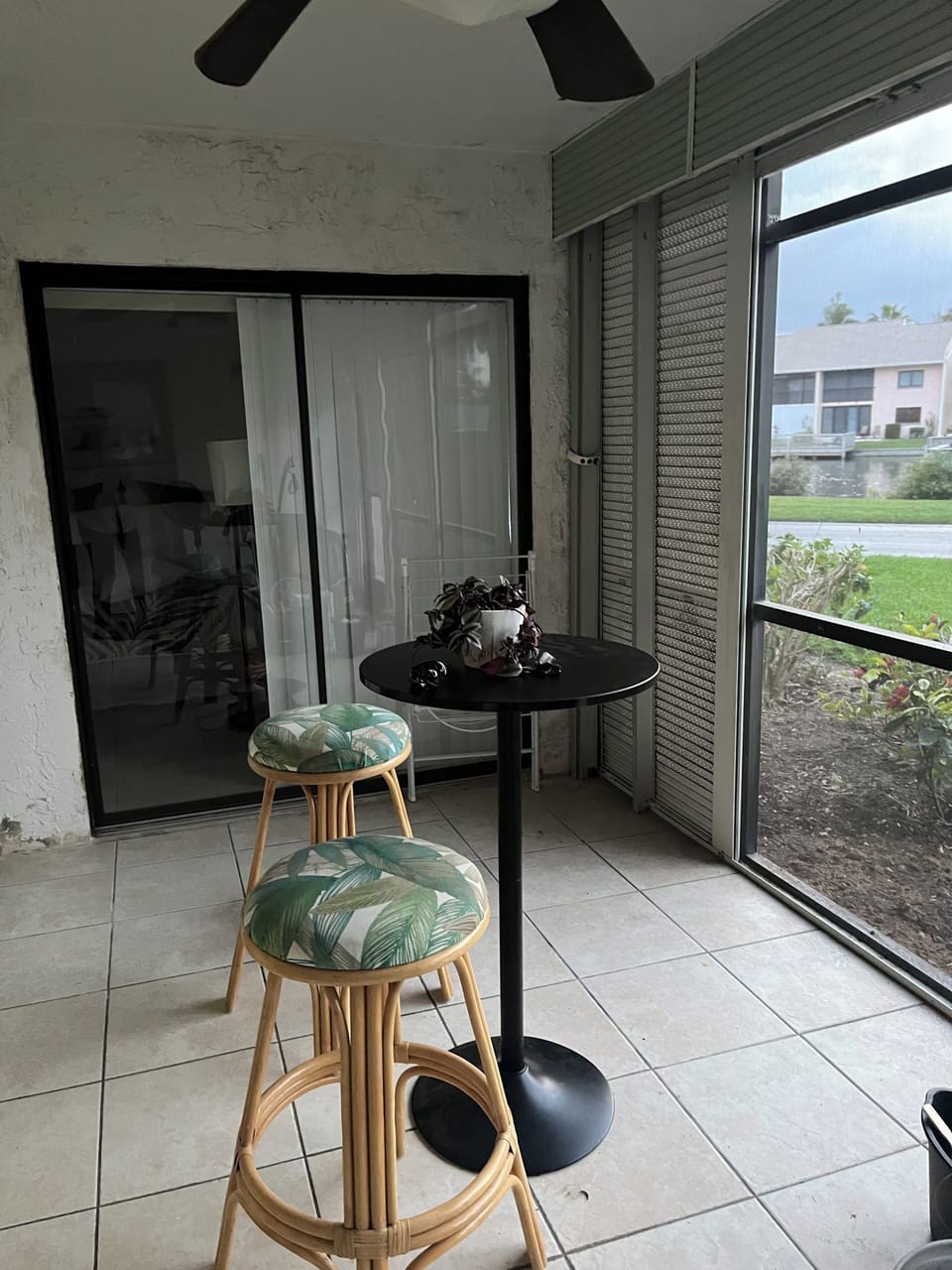 Rear Screened-in Lanai/Porch with Sliding Glass Doors to Bedroom

