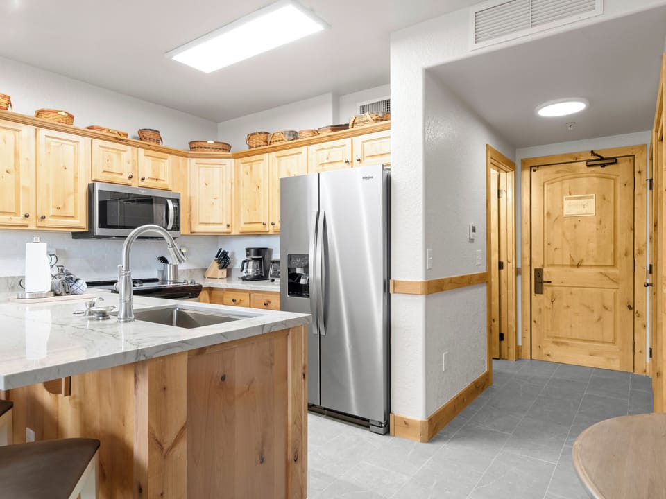 Kitchen / Entry / Bathroom doorway to the Left / Laundry in the closet on the right