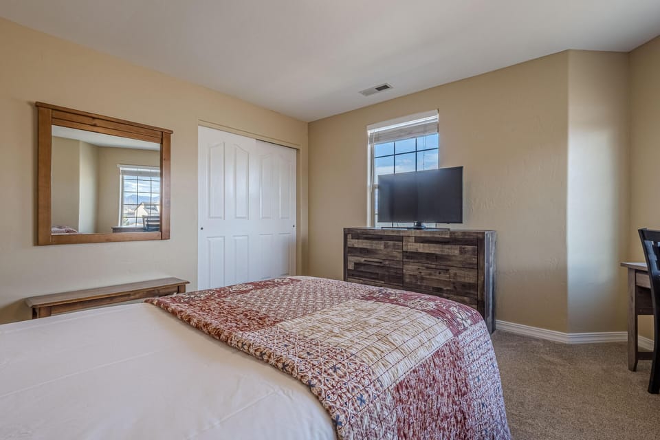 Cozy bedroom retreat with natural light and modern comfort