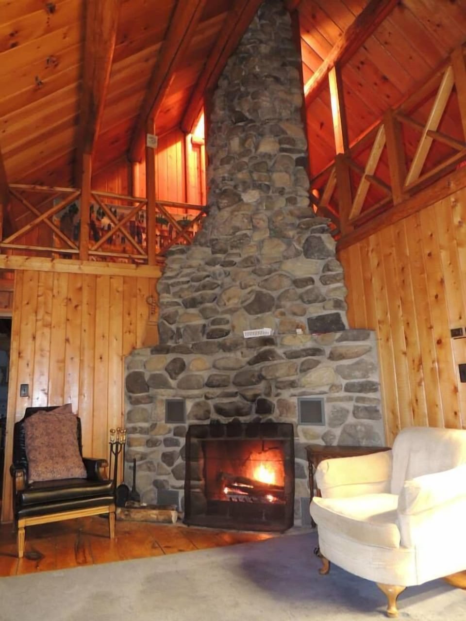Fireplace, also note part of the 2nd floor balcony