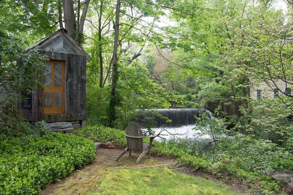 Waterfall view, shed has viewing window if it is raining.  2 chairs now