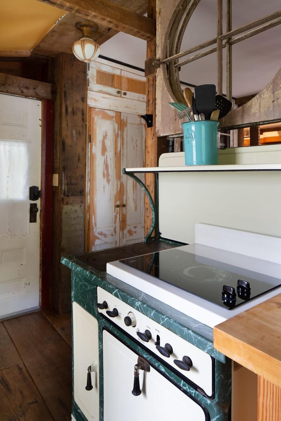 Main floor kitchen, stove replaced with new glass top stove and oven.
