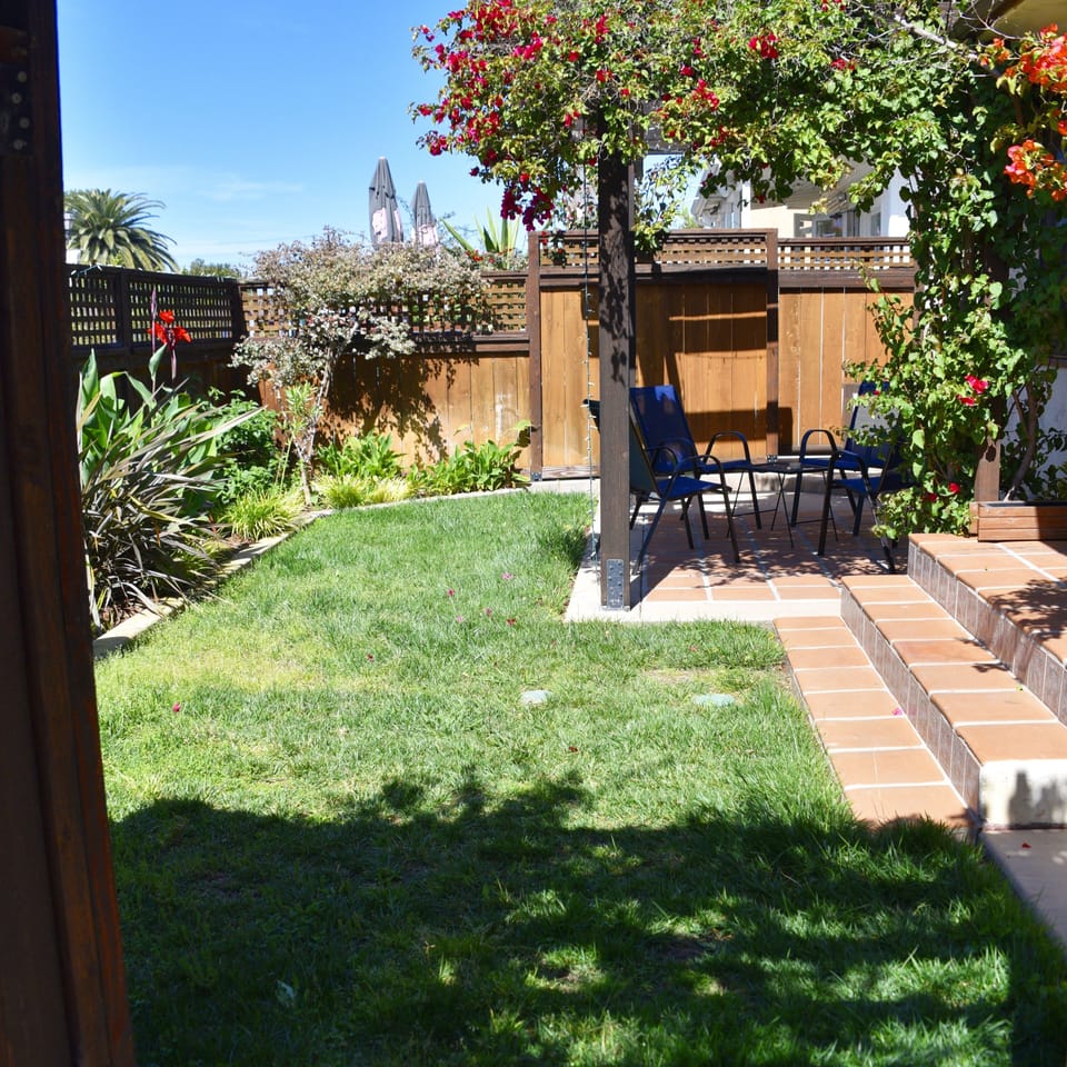 Front yard with shaded sitting area
