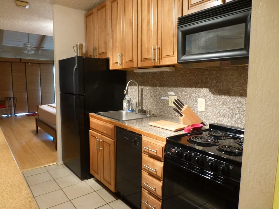 Dishwasher, Fridge, Microwave.  Kitchen stocked with the tools for a great BBQ