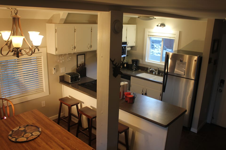 Updated kitchen with modern appliances. The coffee maker is calling your name.