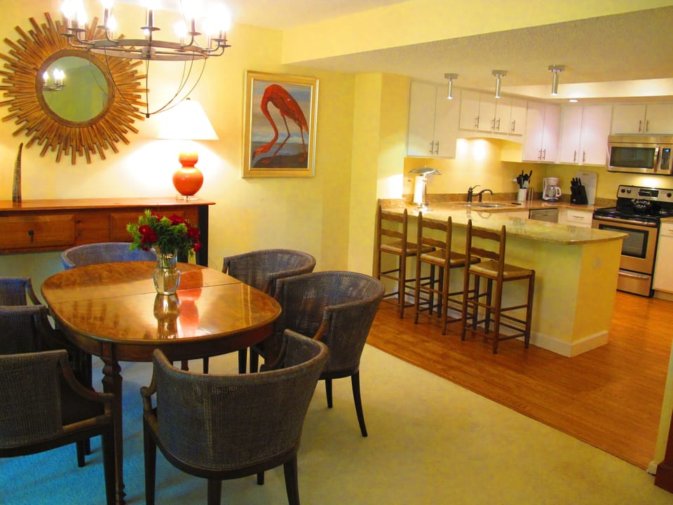 Kitchen has counter seating. Living/Dining areas have lake & mountain views.