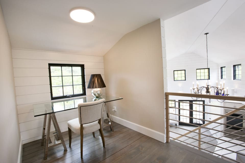 Upstairs office, overlooking the back yard gardens, and above kitchen.