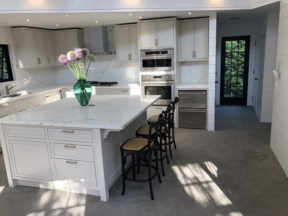 Double wall oven with coffee bar, and mini frig.