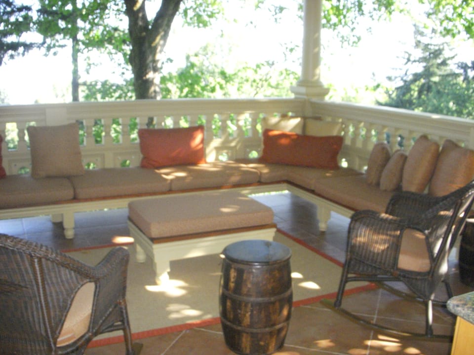 Enjoy a glass of Oregon wine on the deck with city and mountain and river views.