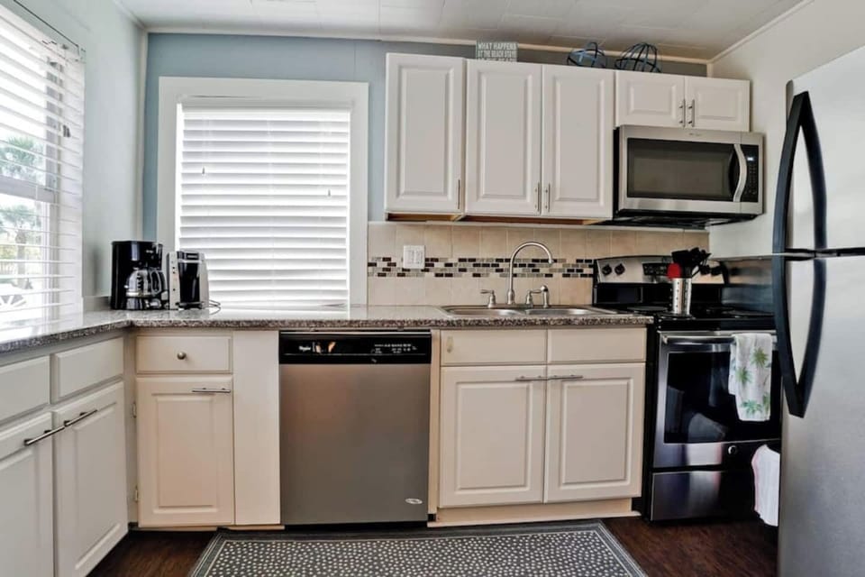 New stainless steel appliances including dishwasher, cook-top range, refrigerator & microwave make meal prep a snap in Villa Margarita's attractive kitchenette.   Villa Margarita delights with many happy repeat guests!