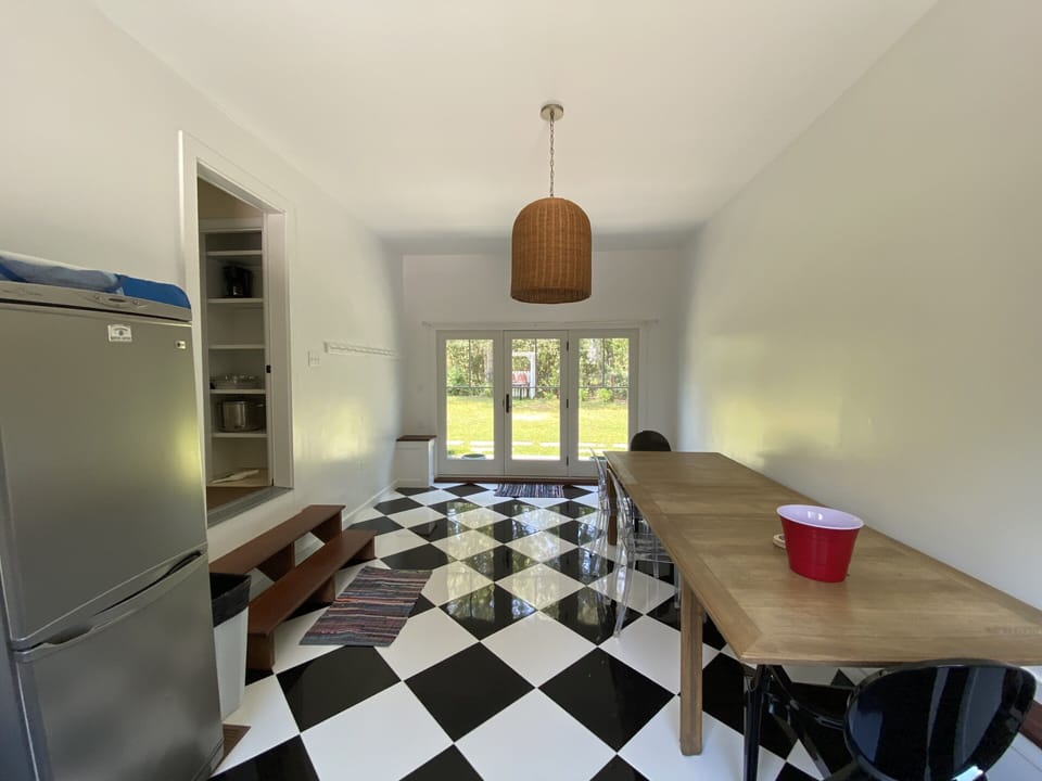 Entry room with lovely glass doors leading to the backyard area