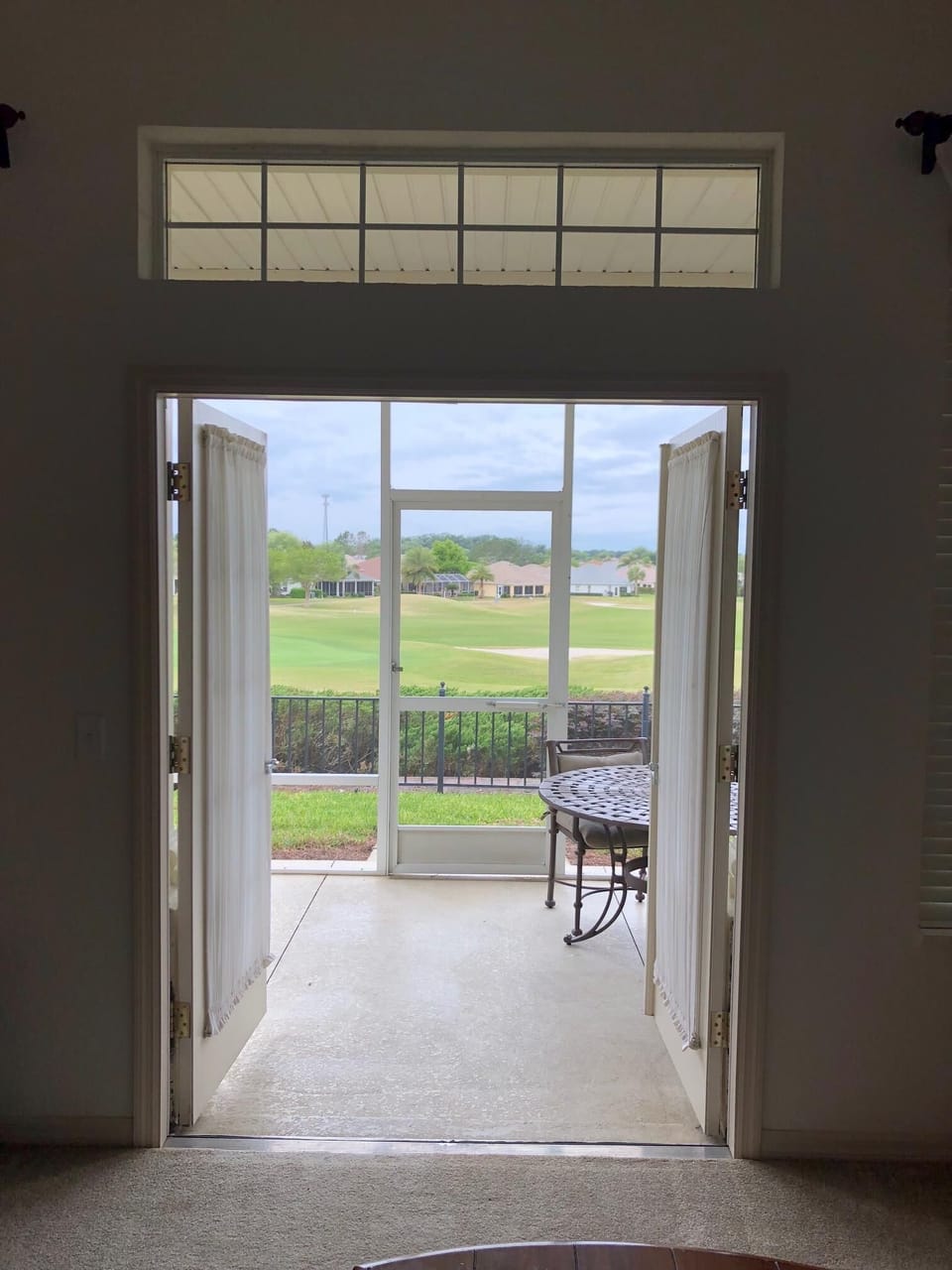 French Doors in Living Room lead to Patio & Views