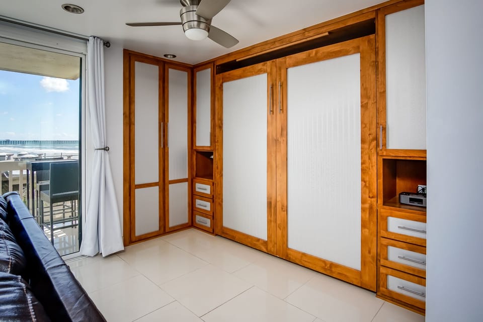 Murphy bed with lots of cedar cabinets/drawers.