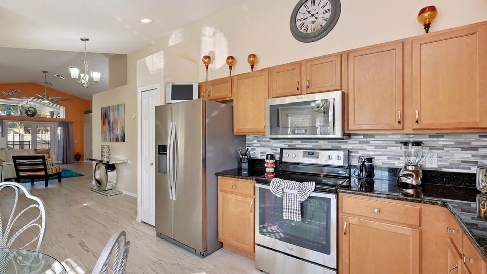 KITCHEN WITH BRAND NEW STAINLESS STEEL APPLIANCES