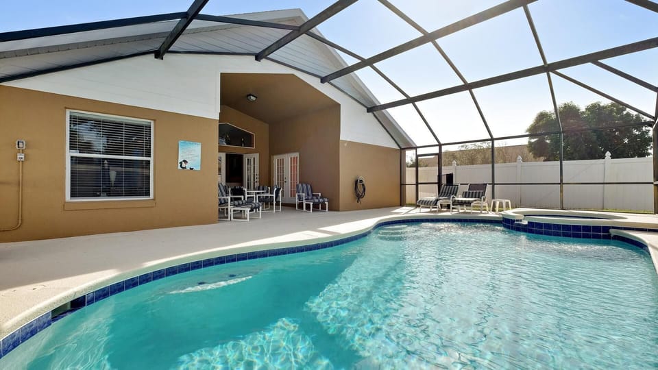 SOUTH FACING POOL AND SPA , FULLY FENCED