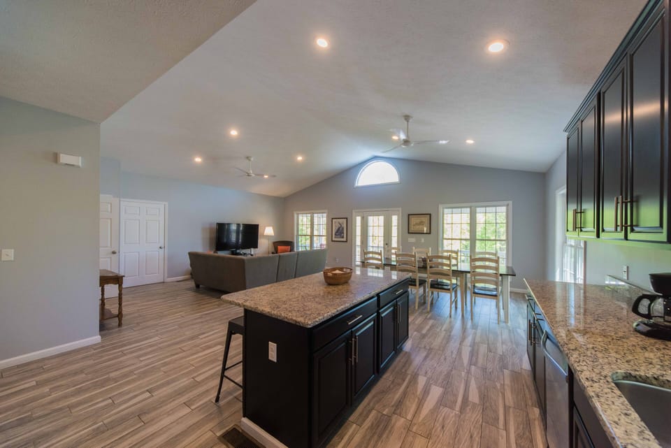 Modern open floor plan with 12.5 foot vaulted ceilings