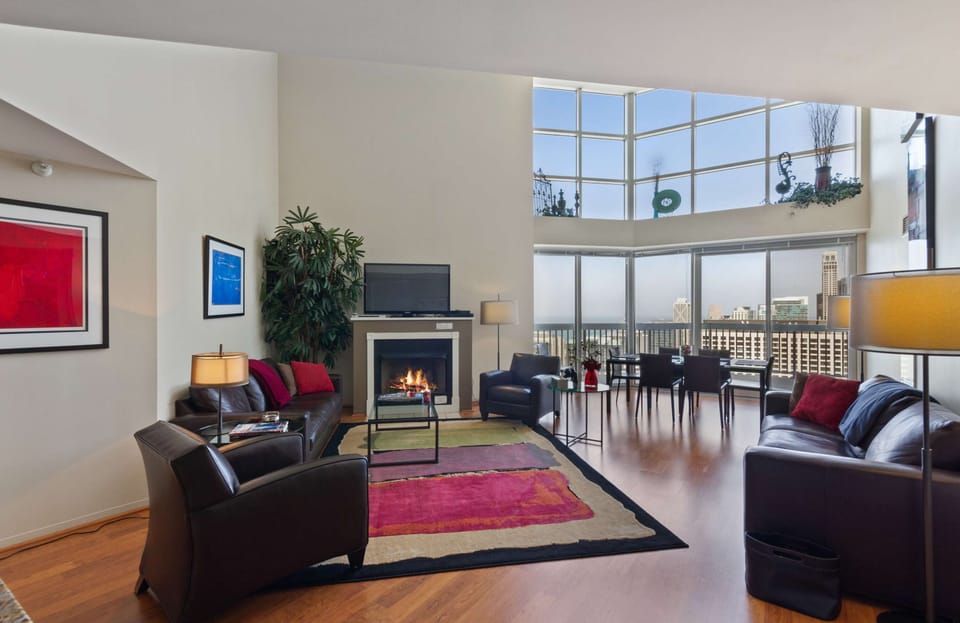Two-story great room with a gas fireplace - Oversized balcony.  Best views in the city.