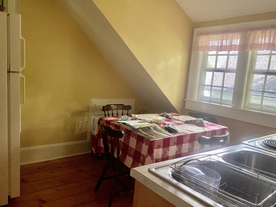 Dining table expands to fit 4-6 people.