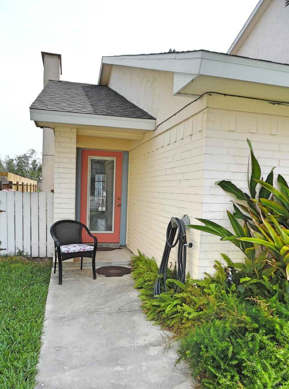 Front entrance from the large fenced yard