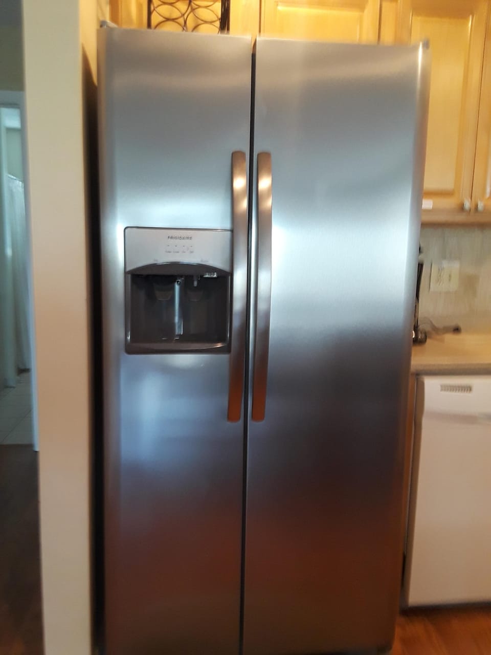 New refrigerator w/ auto ice dispenser and fresh drinking water. No more bottles