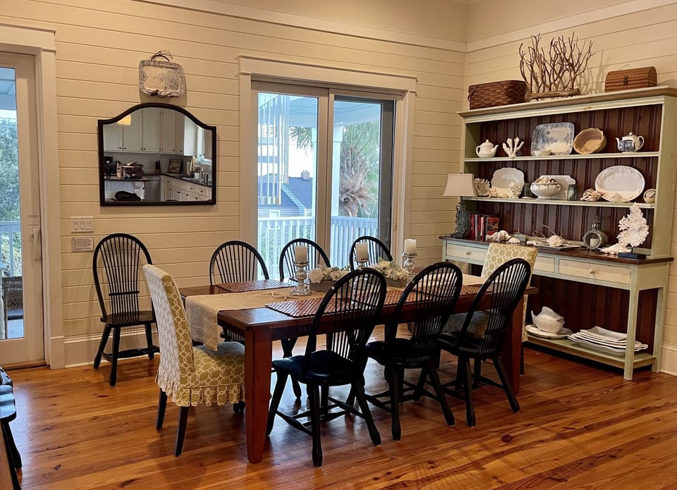 Dining room area seats 10-12 plus 9 more at kitchen island barstools