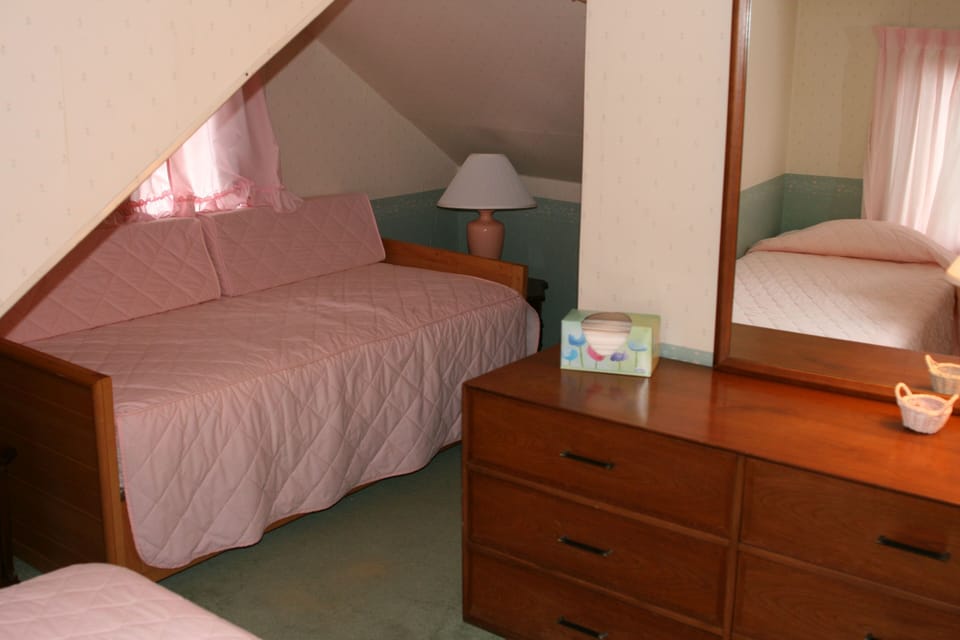 Front bedroom with three singles