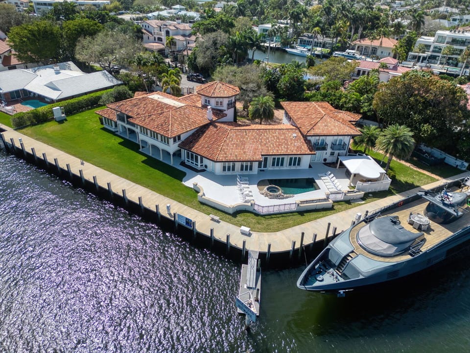 Waterfront Elegance — Your Private Resort-Style Estate with Dock, Pool & Sunset Views