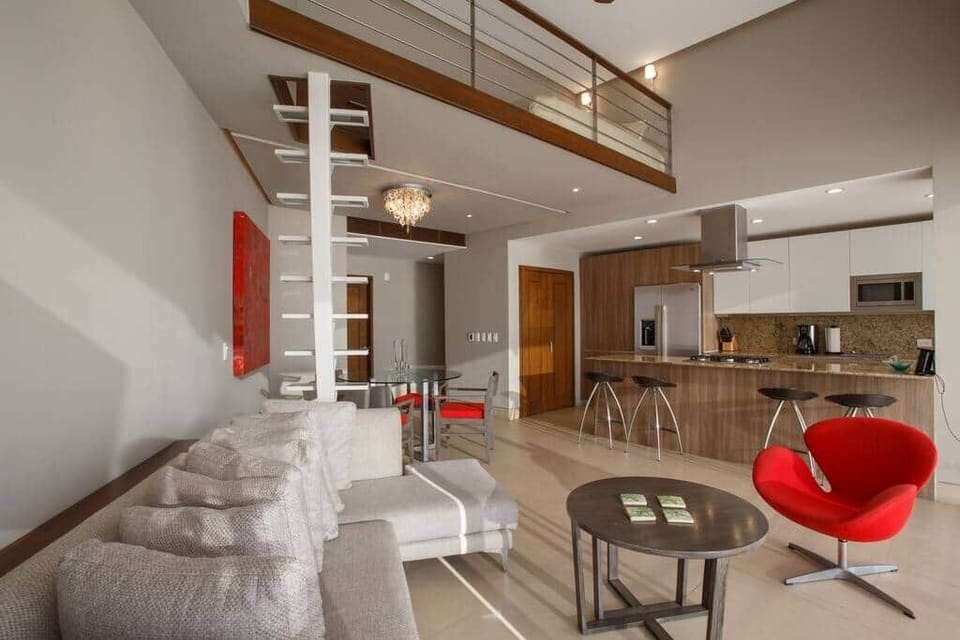 The stairs shown are only to access a small loft with a single bed.